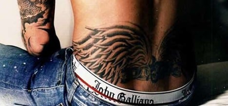 Wings Originating from the Spine Tattoo
